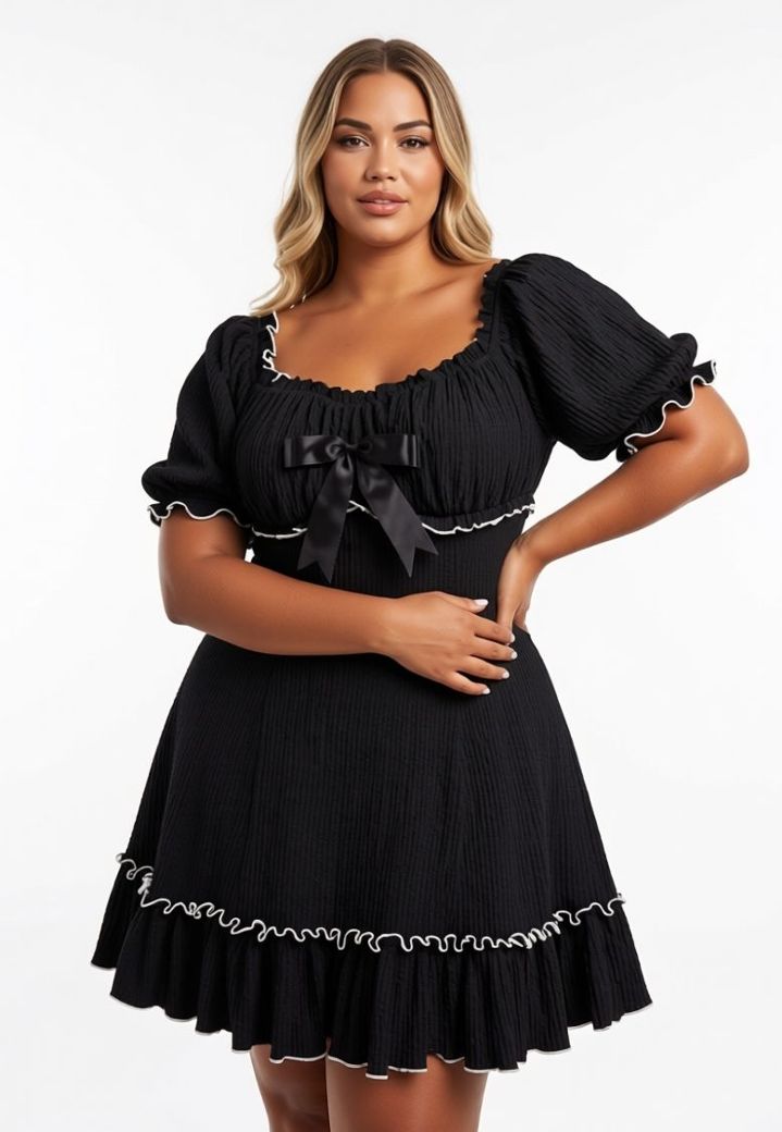 Venezia black dress with puff sleeves and a bow